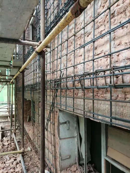 滦县梁粘碳纤维加固工程方案施工速度快因而加固后几乎不增